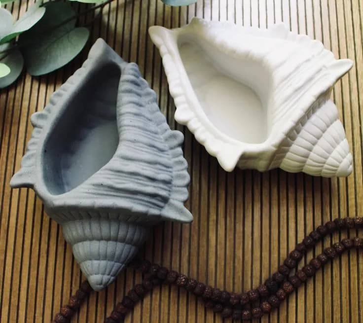 Gypsum Seashell Decorative Showpiece - For Home Decor — fabric close-up